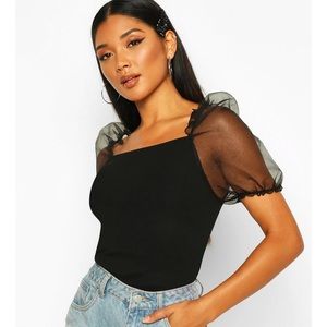 Puffy black going out/shirt stunning